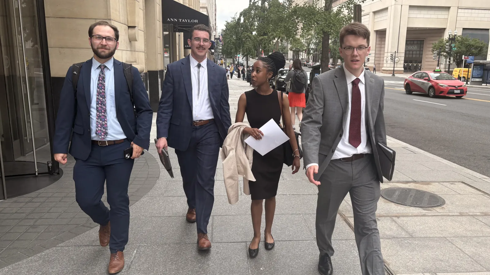 "IDEA fellowship coordinator Adam Duffy and Summer Democracy Fellows Maxwell Kiernan, Elise Britton and Ryan Mahoney walking to their next meeting in DC June 22."